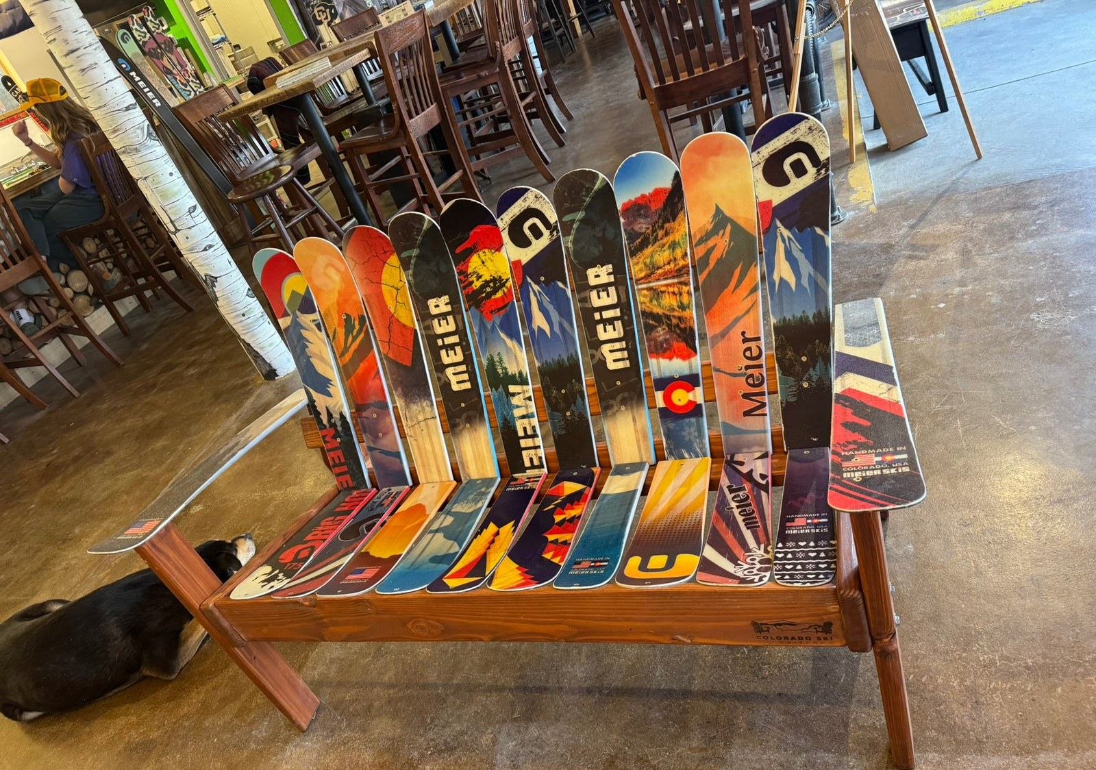 Chair made from repurposed ski boards in a casual setting